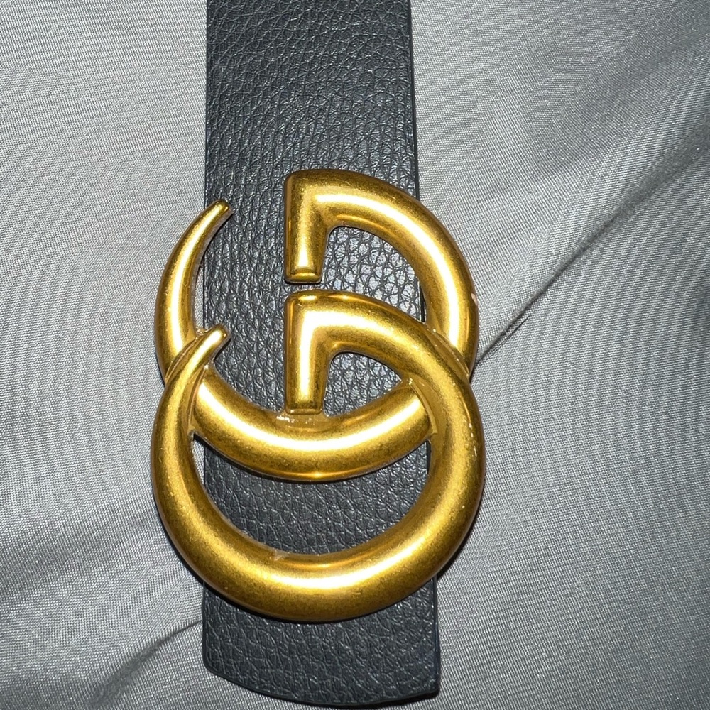 Gucci belt around 48 inches, minor wear on end of belt